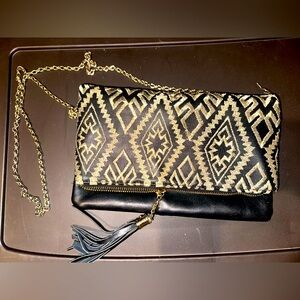 Gold and black pretty purse wallet. With gold chain